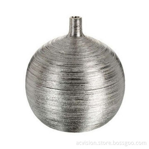 Silver ceramic vase with lines on the surface